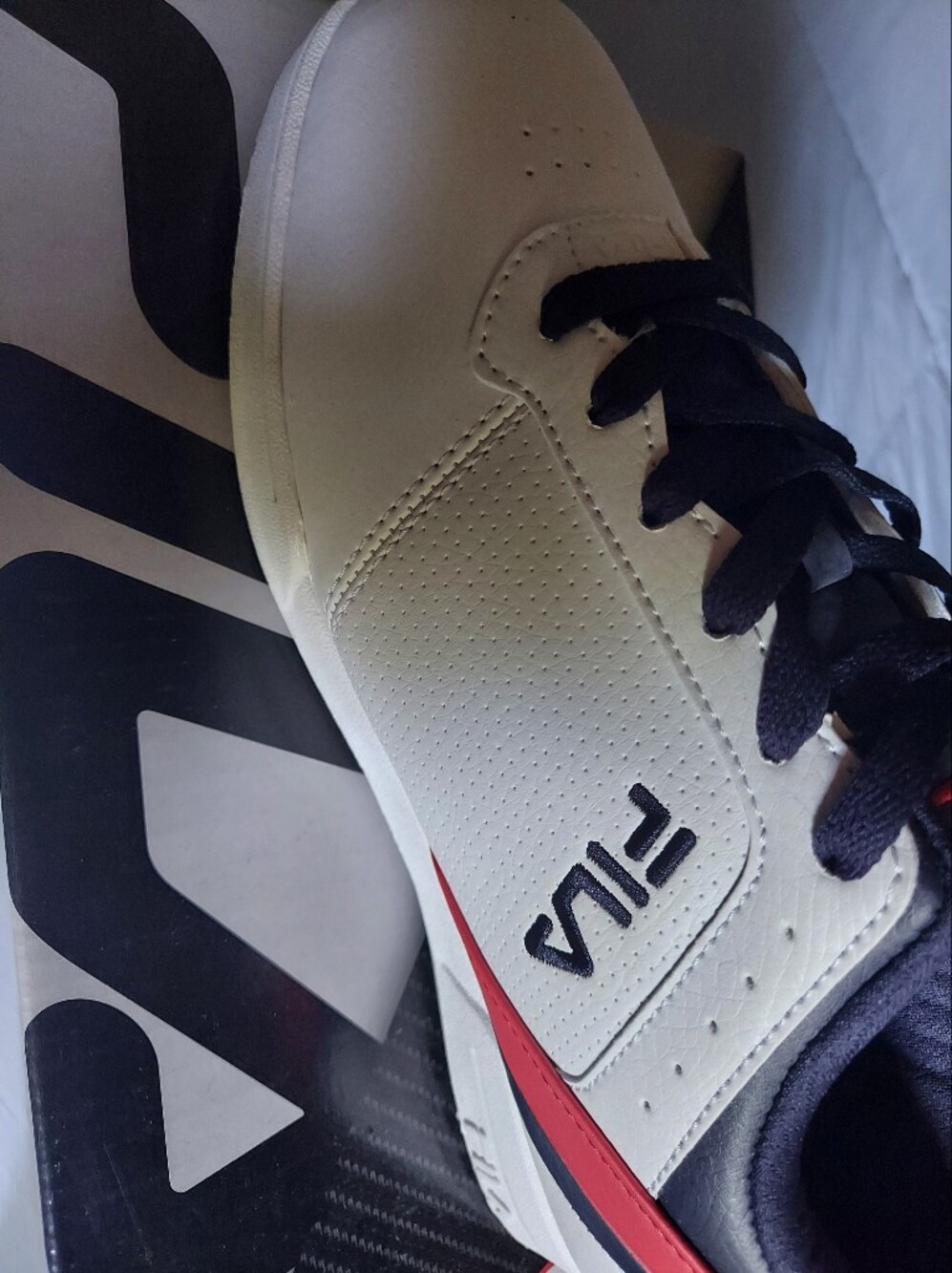 FILA Men’s White Sneakers with Black Laces and Red Accent